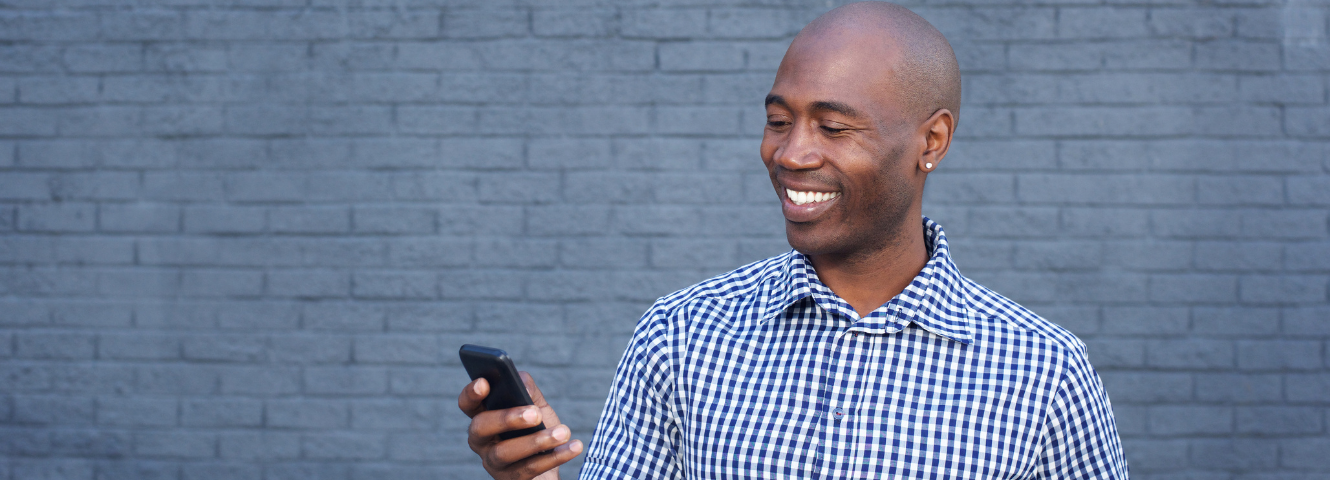 man looking at phone