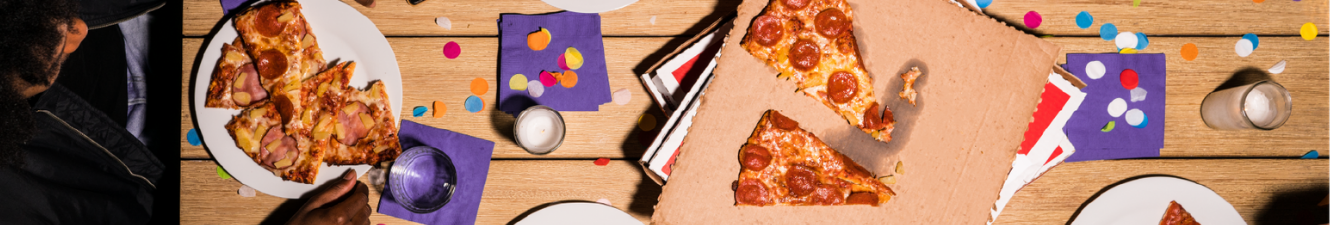 pizza slices on party table