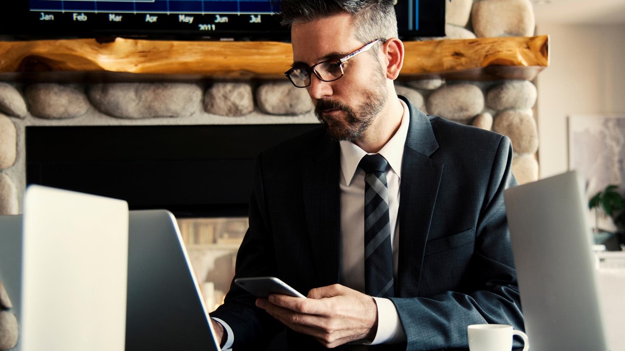 man looking at laptop