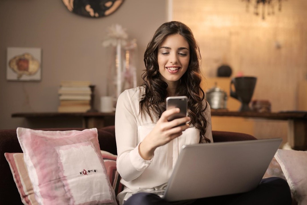 Young woman looking at phone